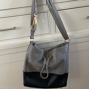 Leather Perlina Bucket Bag. Convertible strap. Made in Italy.